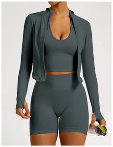 Detail of dark grey 3-piece seamless yoga set featuring ribbed waistband and gym jacket.