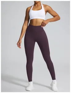 Seamless high-waisted yoga leggings in plum purple designed for fitness and gym workouts