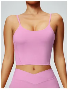 Close-up of a pink sports yoga camisole with thin straps and built-in chest pads.