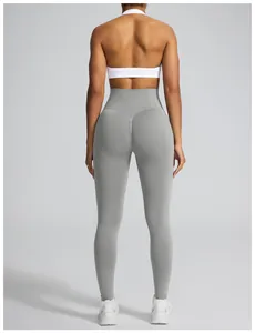 Close-up back view of high-waisted grey seamless scrunch butt yoga leggings for gym