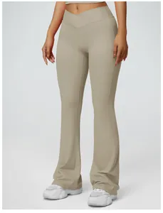 Women's high-waisted flare yoga pants featuring a cross-front waistband in khaki beige color