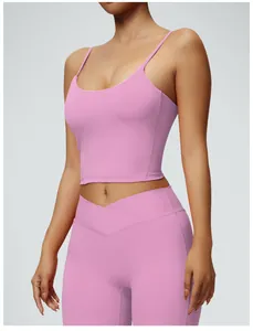 Detailed shot of pink padded yoga tank top featuring slim fit and elastic material