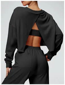 Rear detail of black open back cropped sweatshirt for women's fitness and sports training