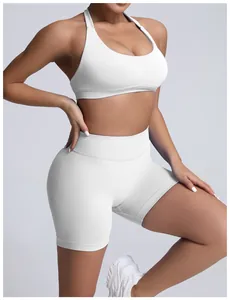 Detail view of white seamless high-waisted yoga shorts set showing fit and texture