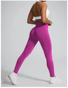 High-waisted seamless peach butt yoga leggings in vibrant magenta for fitness and gym