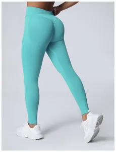 Detail view of high waist seamless yoga leggings showing peach butt lifting effect.