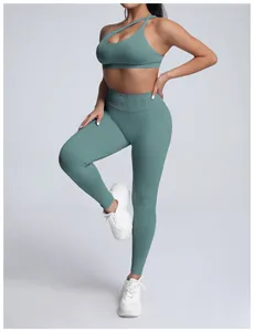 Professional high-waisted seamless sage green yoga set with sports bra and leggings.