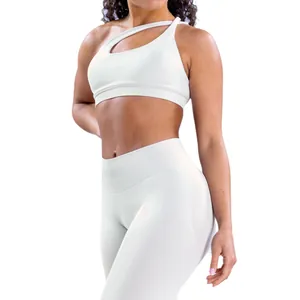 Professional white seamless one-shoulder high-stretch sports bra and matching leggings set