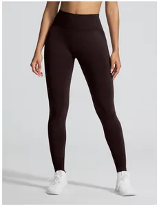 Naadloze push-up yogabroek van donkerbruine kationische stof met jacquard details