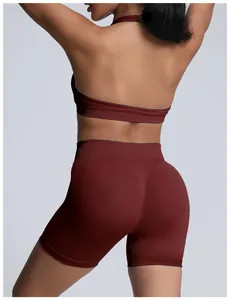 Rear detail showing the fit of seamless high-waist yoga shorts in matte burgundy