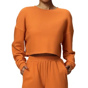 Casual orange cropped crew neck long sleeve sweatshirt for sports and fitness activities