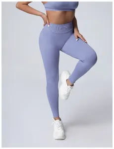 Detailed view of seamless high-waisted purple gym leggings for butt lifting workout