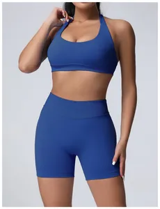 Detail of blue seamless high-waisted yoga set with matte finish for fitness and running