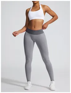Nahtlose graue High-Waist-Yogahose mit Po-Lifting-Effekt für Damen beim Fitnesstraining