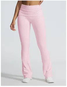 Professional detail view of light pink high-waisted yoga flare pants with folded waistband