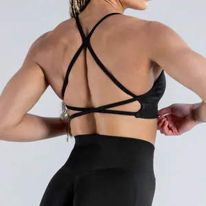 Close-up of seamless matte nylon yoga bra with cross-back strap design