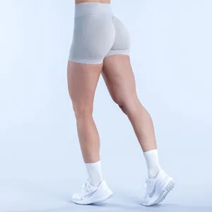 Detail showing the scrunch butt design of seamless high-waisted grey gym shorts