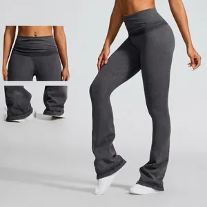 High-waist seamless flared yoga pants with fold-over waistband in charcoal grey