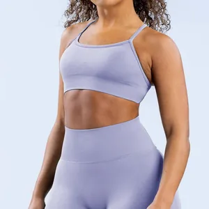 Detailed view of a light purple seamless matte nylon sports bra with a comfortable fit