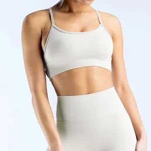 Detail view of seamless matte nylon yoga sports bra showing the premium cross back design