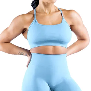 Women's light blue seamless sports bra and high waist leggings for yoga and fitness training