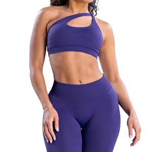 Conjunto de yoga de nailon mate elástico con sujetador asimétrico y leggings sin costuras