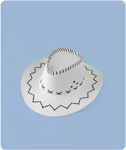 Classic white western cowboy hat with decorative black stitching detail and wide brim