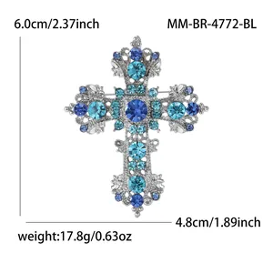 Detailed vintage alloy cross brooch with blue rhinestones showing size 6.0x4.8cm