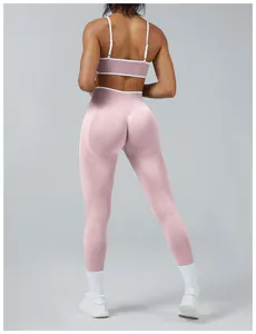 Back view of pink seamless high-waist yoga leggings and sports bra set for women fitness