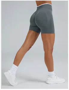 Detail view of grey seamless high-waist yoga shorts featuring a peach lift design for gym