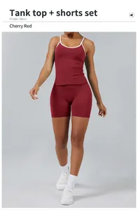 Professional studio shot of a cherry red two-piece yoga set for women with white trim