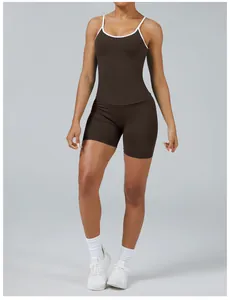 Detailed view of women's brown colorblock quick-dry yoga set with white trim camisole
