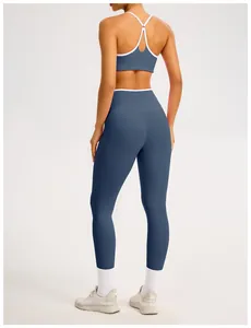 Leggings da yoga blu a vita alta con finiture bianche a contrasto, vista posteriore