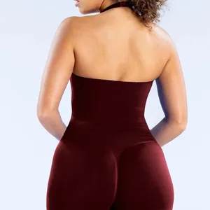 Back view of burgundy halter neck seamless yoga vest and fitness leggings set