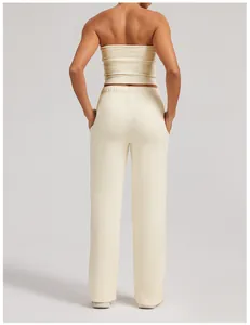 Back view of cream high-waist loose sweatpants and matching strapless tube top set