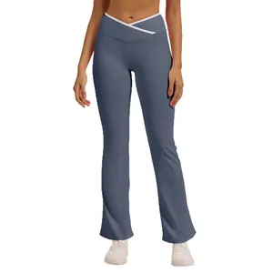 Women's high waisted crossover flared yoga pants in blue-grey for fitness and gym wear
