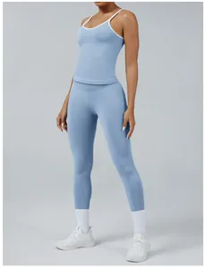 Detail shot of blue two-piece color block yoga set with white trim for women's fitness.
