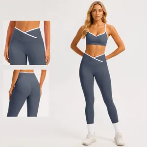 Leggings yoga a vita alta incrociata da donna con profili a contrasto e design push-up