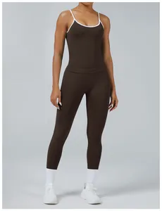 Full body view of a chocolate brown yoga set with elegant white contrast trim detail