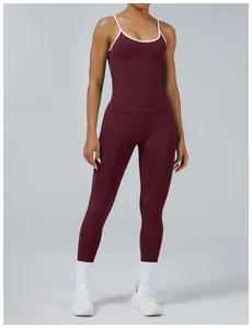 Close-up detail of burgundy and white contrast piping on women's yoga set