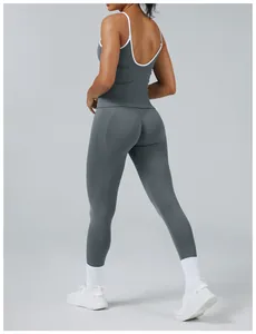 Detailed back view of women's grey colorblock yoga set with racerback top and tight leggings