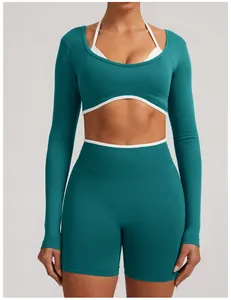 Detail of seamless fake two-piece long-sleeve yoga top with white contrast trim