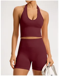 Detailed view of burgundy seamless yoga set with halter top and ribbed waistband