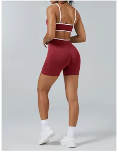 Back view of burgundy contrast yoga set with backless sports bra and shorts