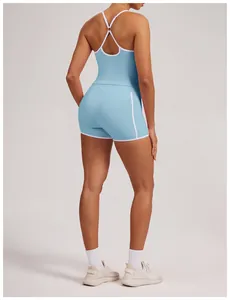 Back view of light blue yoga set featuring cross-strap tank top and high-waist shorts