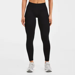 Hoch taillierte nahtlose schwarze Yoga-Leggings mit Bauchkontrolle und Push-up-Effekt.