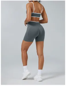 Professional back view of grey contrast yoga set featuring backless bra and high waist shorts