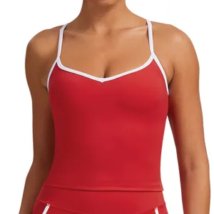 Red athletic yoga tank top with white contrast piping and slim straps for women fitness