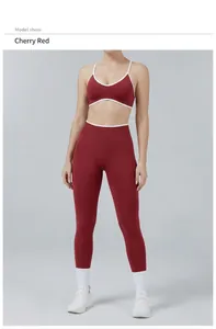 Women's contrast color yoga set in cherry red featuring sports bra and leggings