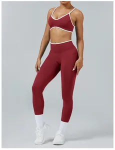 Maroon and white two-piece yoga set with high-waist leggings and sports bra for fitness gym